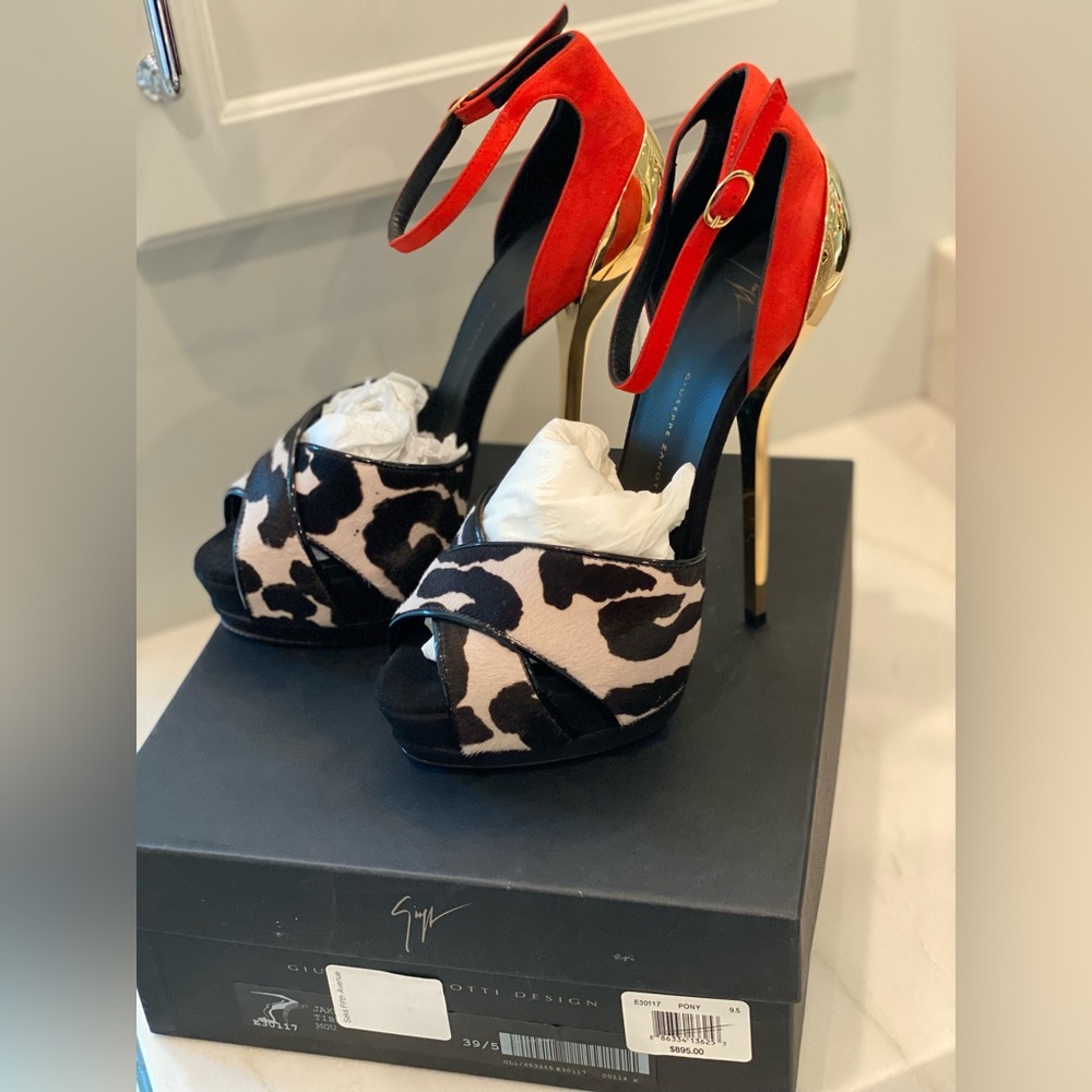 These authentic Giuseppe Zanotti high heeled sandals are a must have!